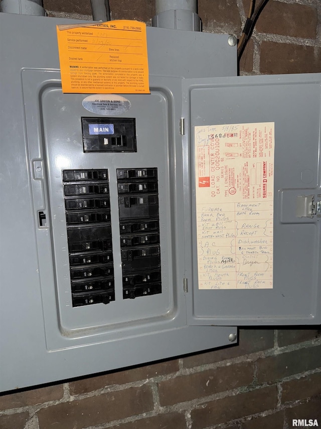 utility room featuring electric panel