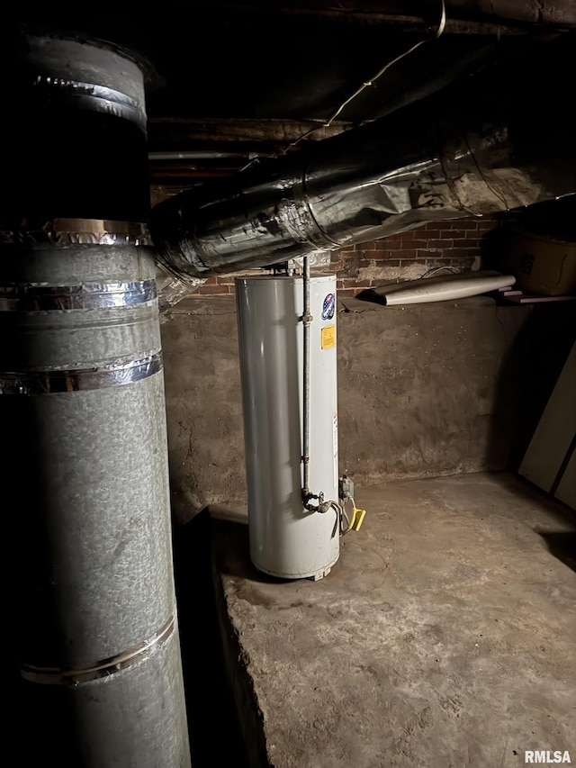 utility room with water heater