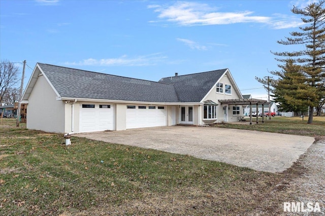 view of front of property featuring a garage, a pergola, a front yard, and french doors