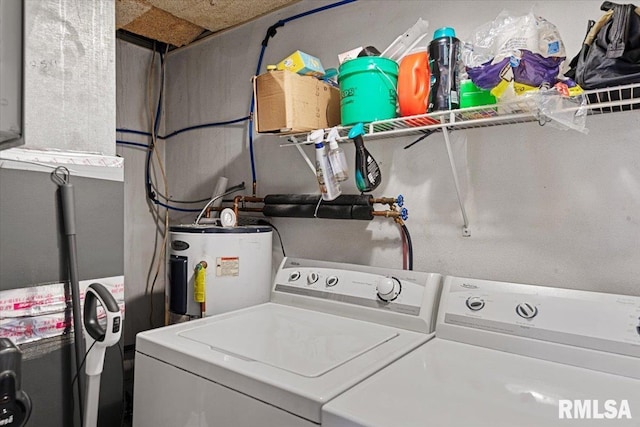 clothes washing area with electric water heater and washing machine and clothes dryer