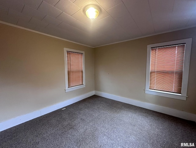 carpeted empty room with ornamental molding