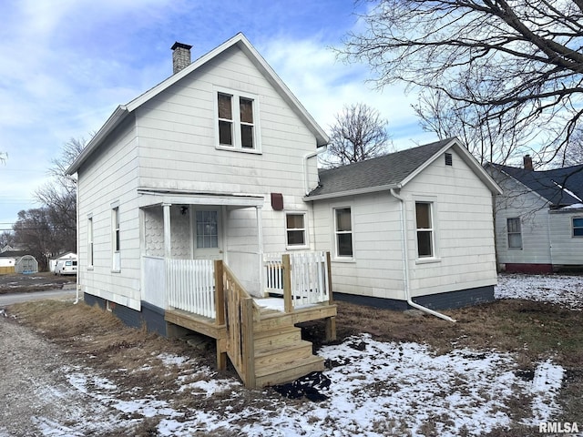 view of snow covered property