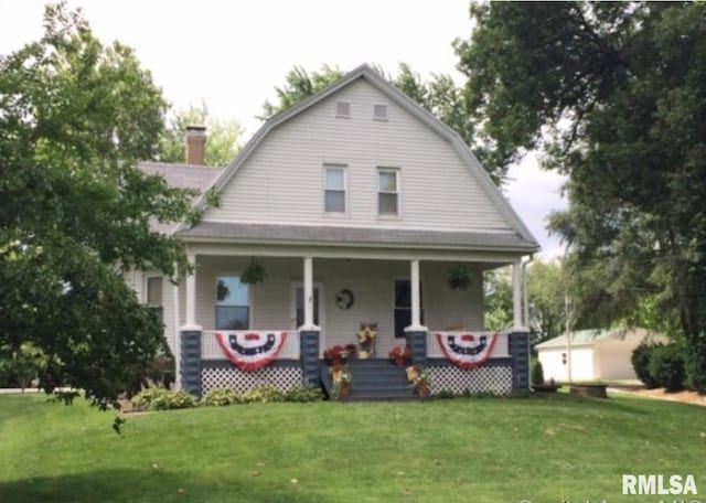 view of front of home with a front yard