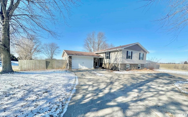 split level home with a garage