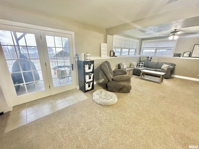 tiled living room with ceiling fan