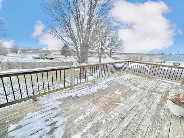 view of snow covered deck