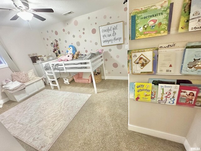 carpeted bedroom featuring ceiling fan