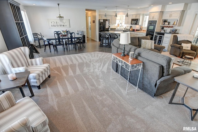 living room featuring sink