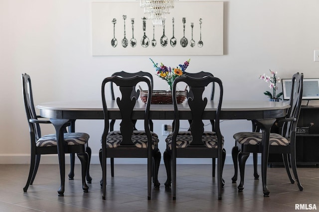 dining room featuring a notable chandelier