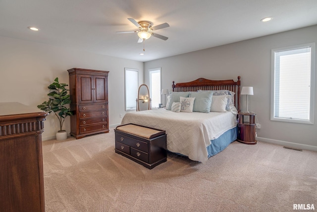 carpeted bedroom with ceiling fan