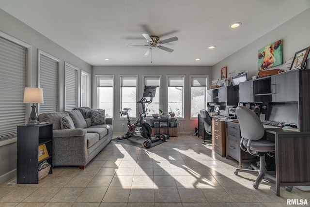 office with ceiling fan and light tile patterned floors