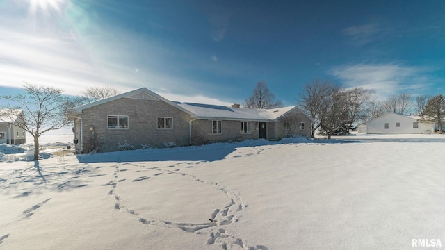 view of snow covered property