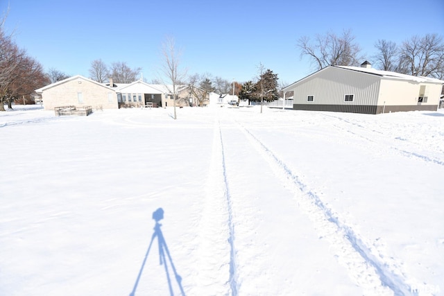 view of snowy yard