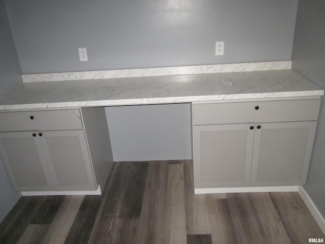 kitchen with white cabinetry and dark hardwood / wood-style flooring