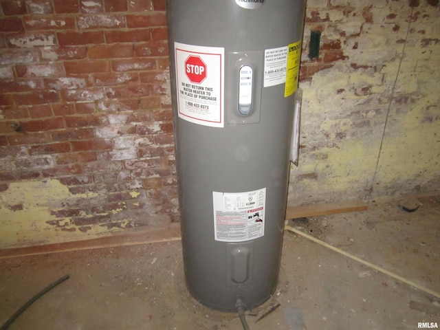 utility room featuring electric water heater