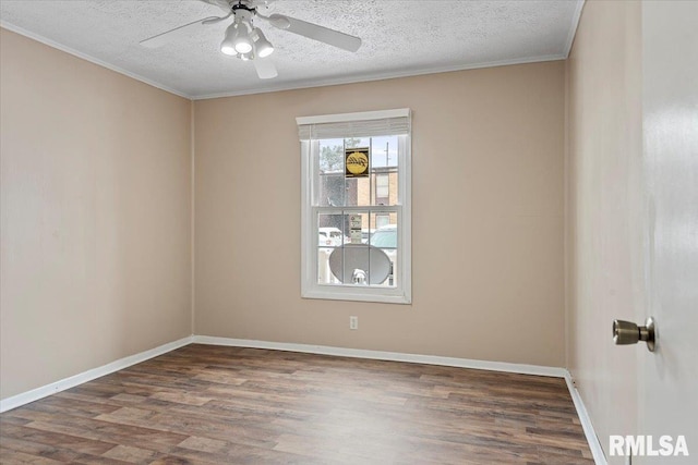 unfurnished room with ceiling fan, ornamental molding, a textured ceiling, and dark hardwood / wood-style flooring