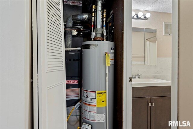 utilities with sink and water heater