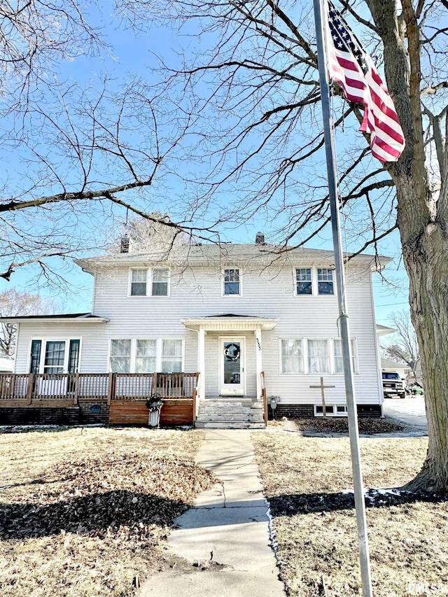 view of front of property featuring a wooden deck