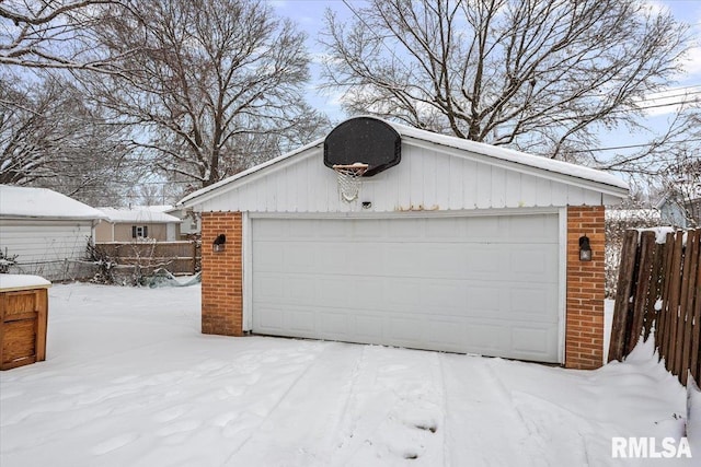 view of snow covered garage