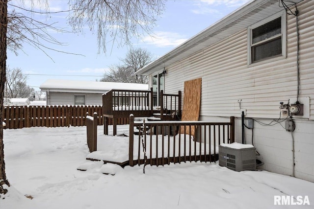 view of snow covered deck