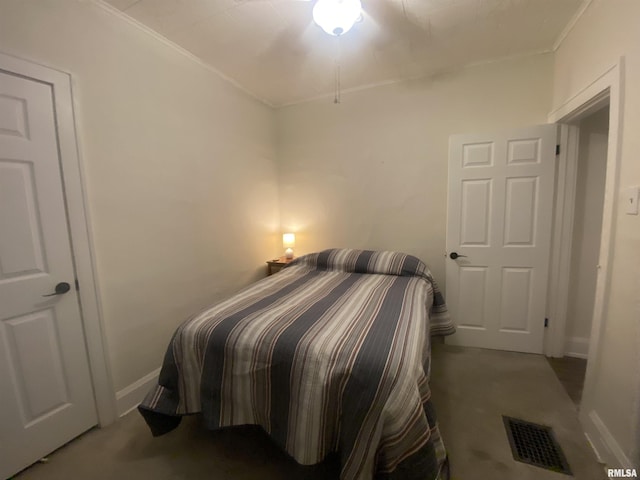 bedroom featuring carpet floors and ornamental molding