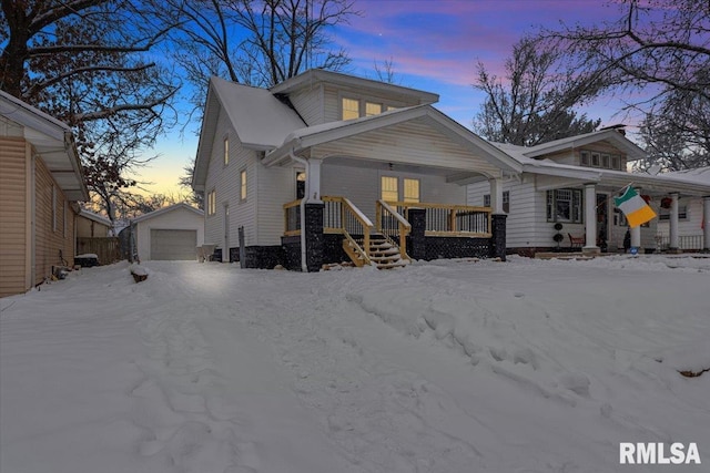 view of front of house with an outbuilding and a garage