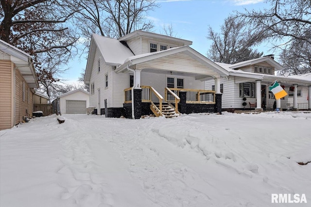 view of front of house featuring an outbuilding and a garage