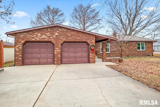 ranch-style house featuring a garage