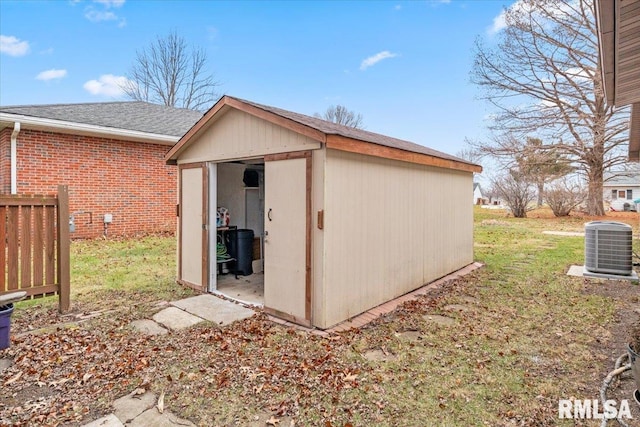 view of outbuilding with central air condition unit