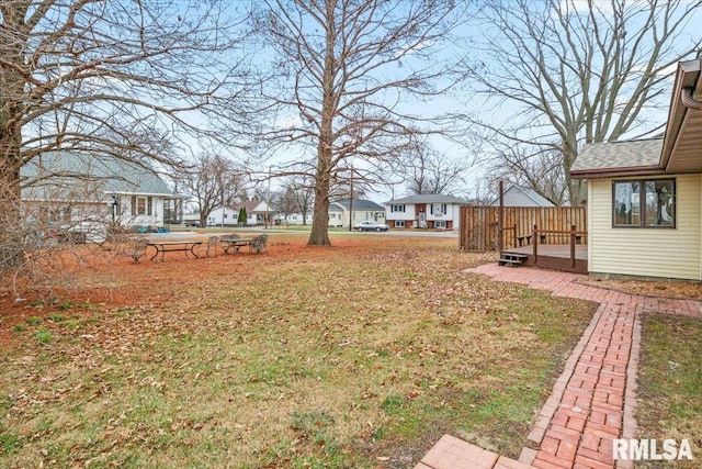 view of yard featuring a wooden deck