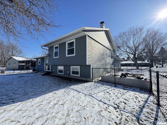 view of snow covered house