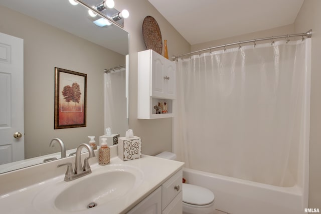 full bathroom with vanity, toilet, and shower / bath combo with shower curtain