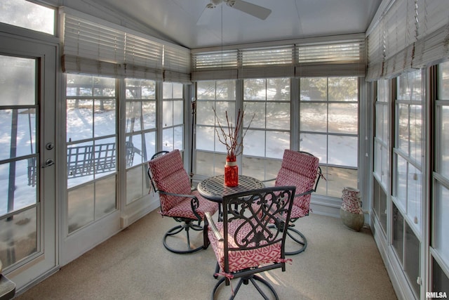 sunroom featuring ceiling fan