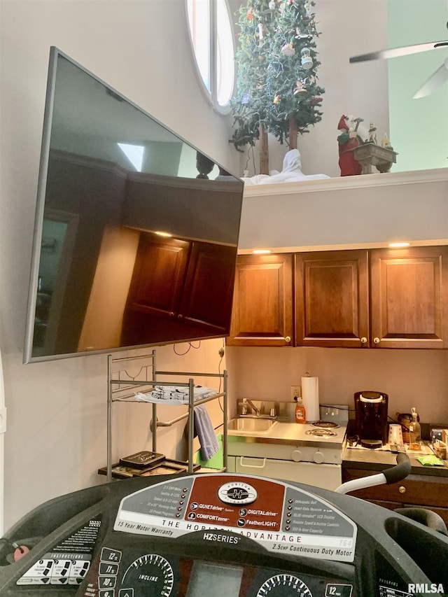 kitchen featuring a sink and brown cabinets