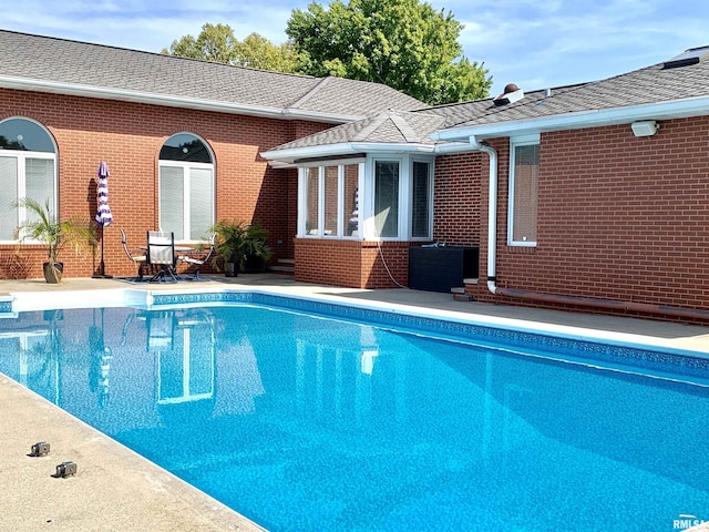 pool featuring a patio area