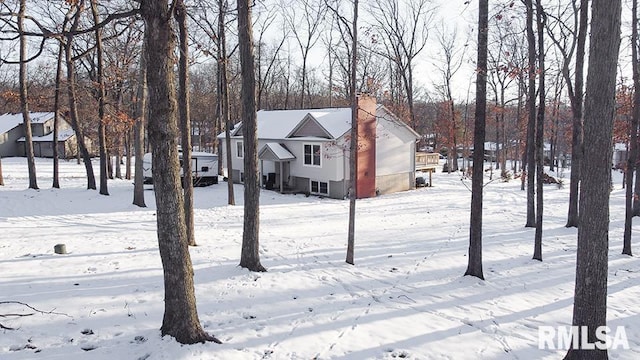 view of snowy yard