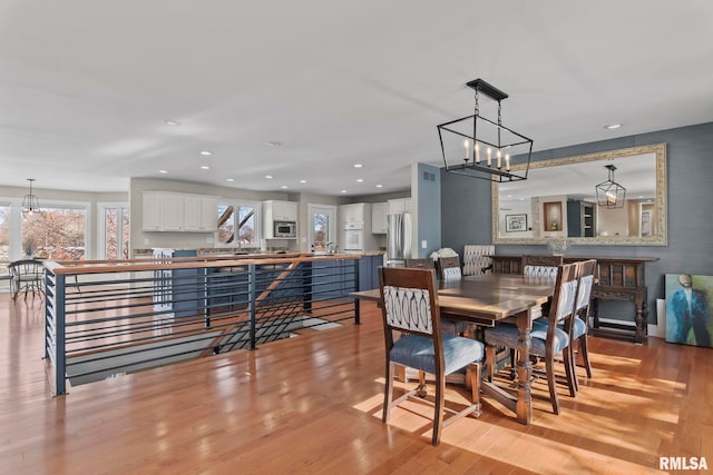 dining room featuring light hardwood / wood-style floors