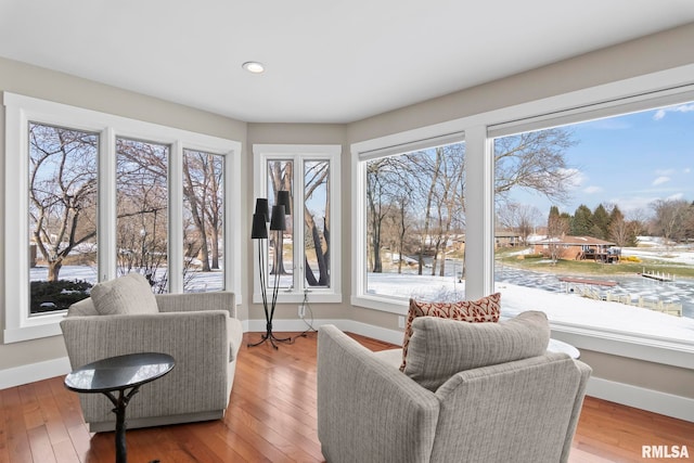 sitting room with light hardwood / wood-style flooring