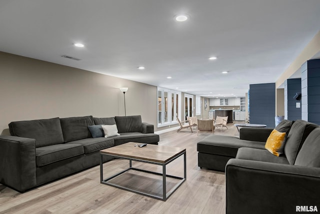 living room with light wood-type flooring