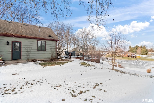 view of yard layered in snow