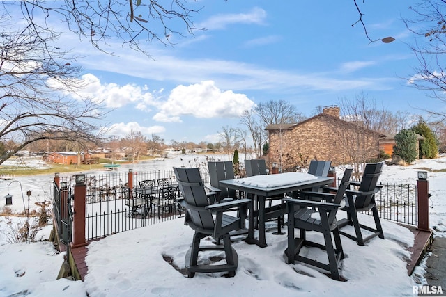 view of snow covered deck