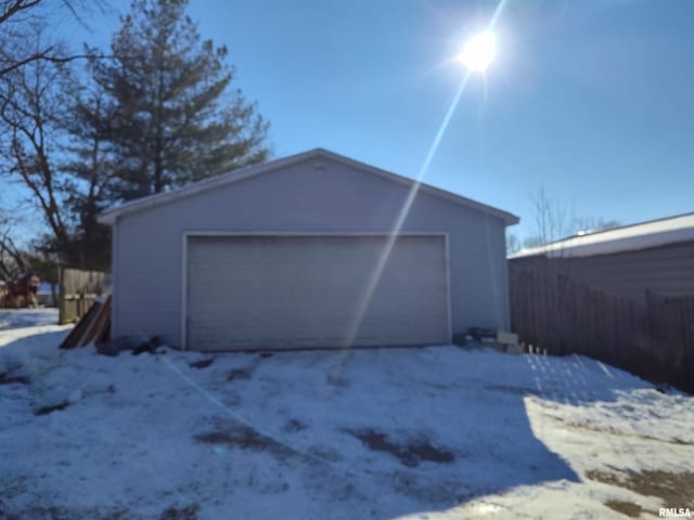 view of snow covered garage