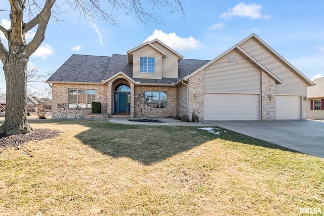 traditional-style home featuring an attached garage, driveway, a front lawn, and brick siding