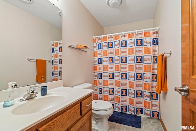 full bath featuring tile patterned flooring, a shower with curtain, vanity, and toilet