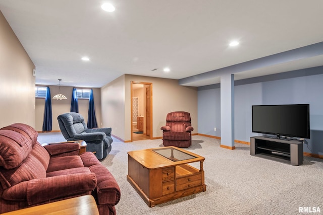 living area with baseboards, recessed lighting, and light colored carpet