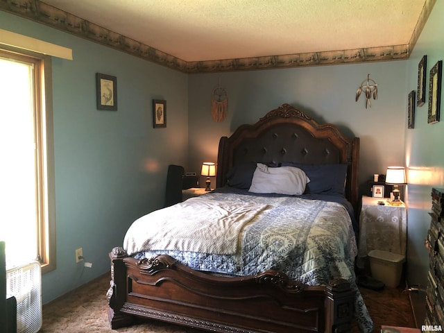 carpeted bedroom featuring multiple windows