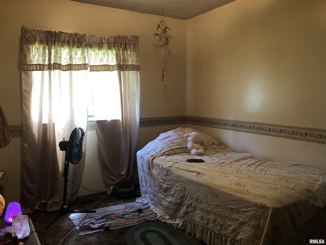 bedroom featuring a textured ceiling