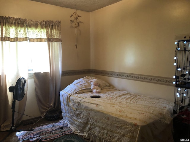 bedroom featuring a textured ceiling