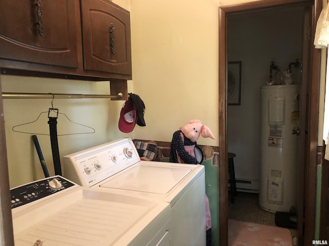 laundry room with water heater, washer and clothes dryer, baseboard heating, and cabinets