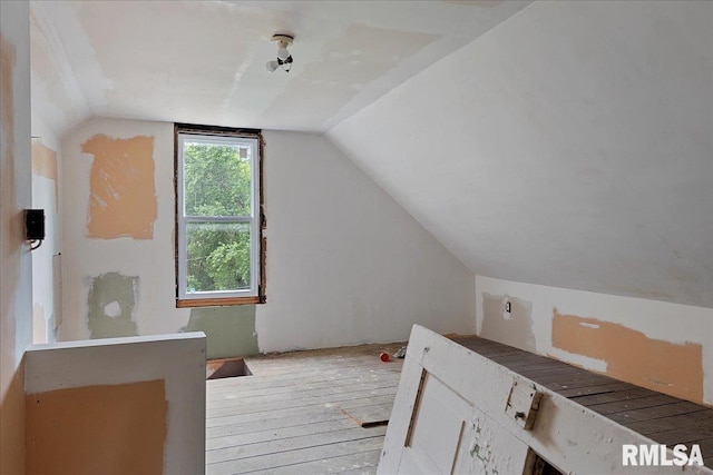 bonus room featuring vaulted ceiling